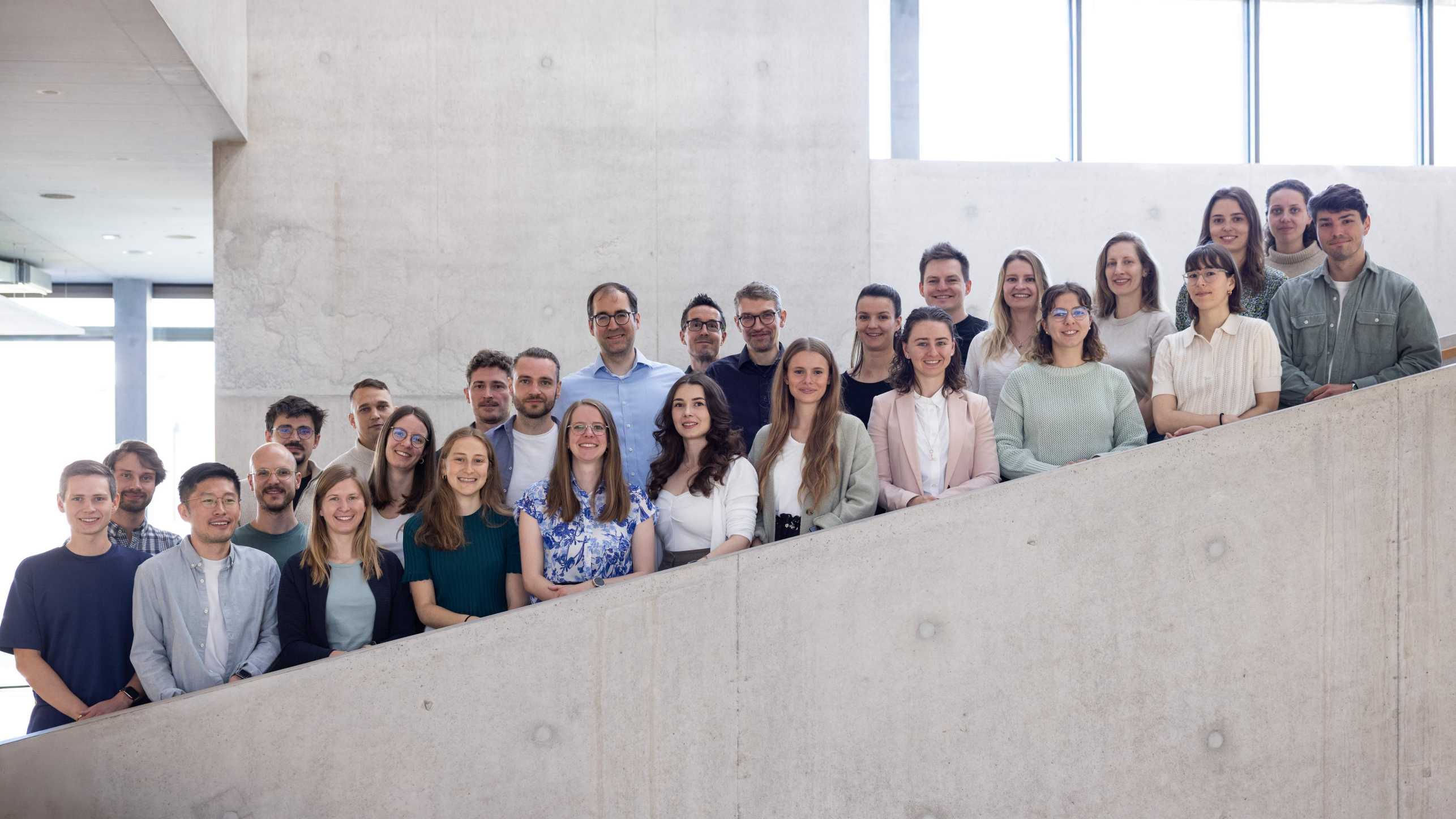 Enlarged view: RELab Team standing on Stairs