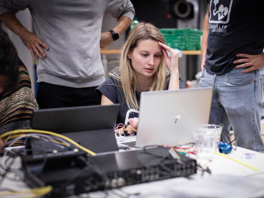 Enlarged view: Hackahealth 2022: Nadine Domnik stearing at Laptop