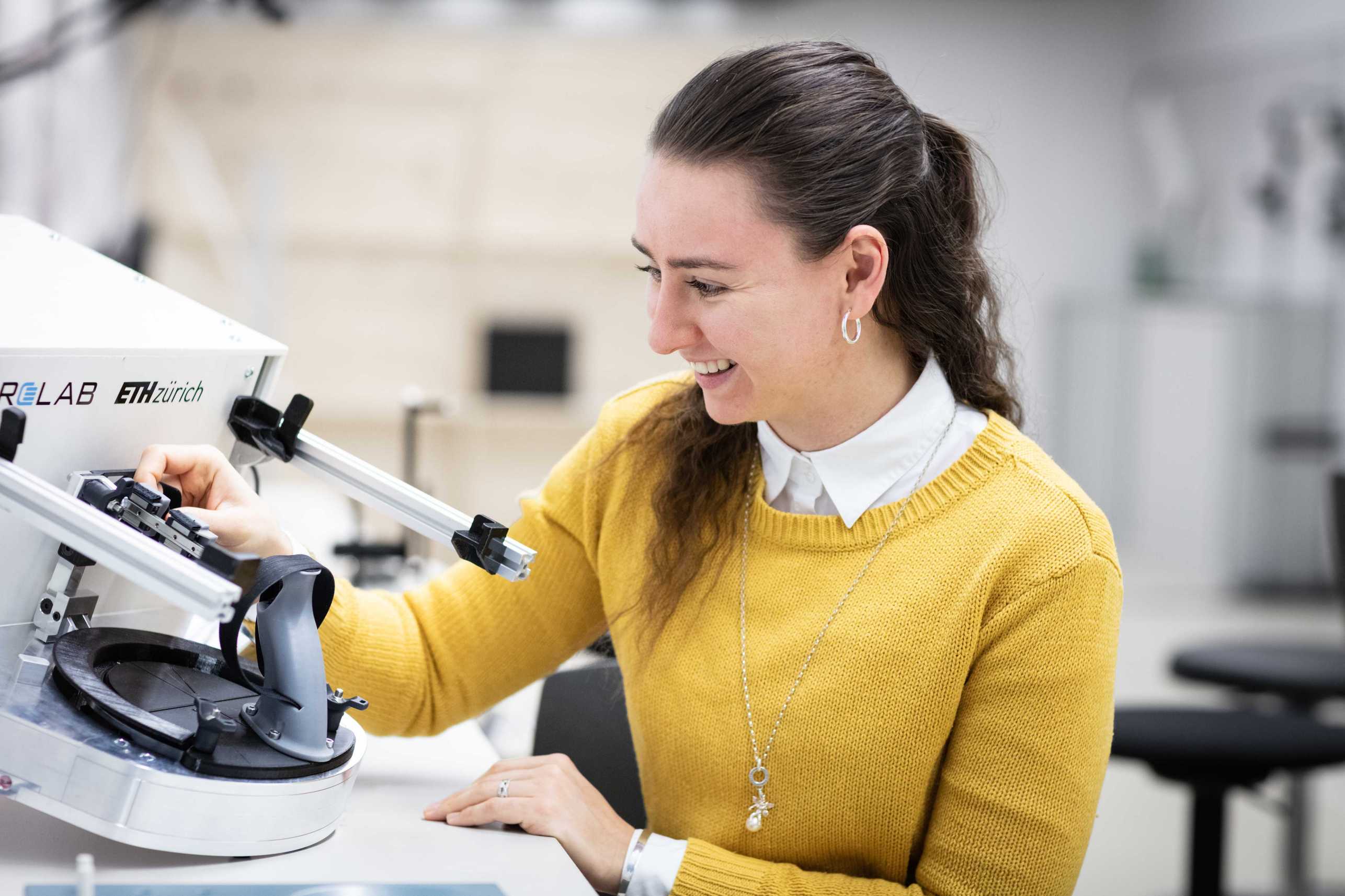 Enlarged view: Anna Knill working on ETH Mike, a Hand Robot for Reahbilitation