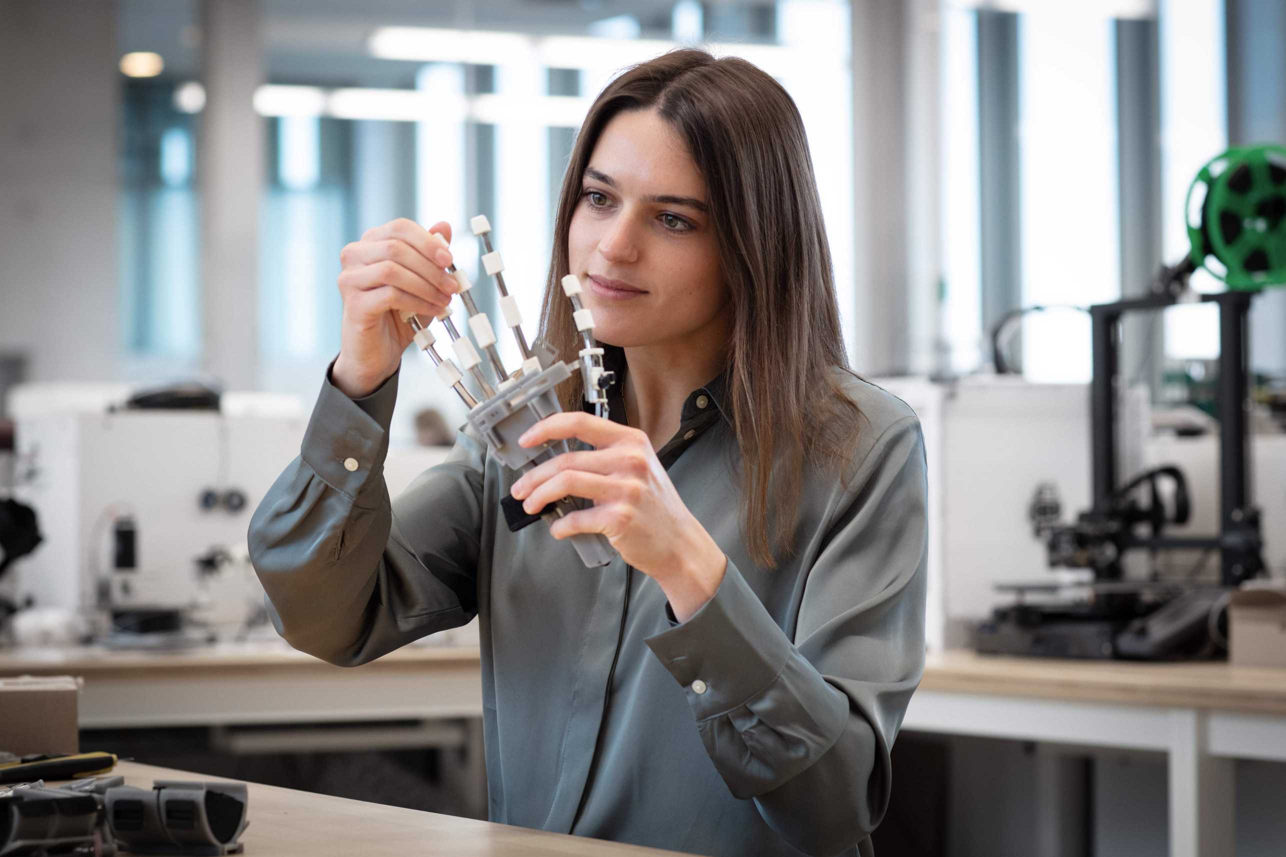 Enlarged view: Margherita Razzoli with hand exoskeleton